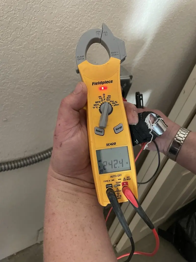 Voltage testing with clamp meter during Generator Installation in Santa Ynez